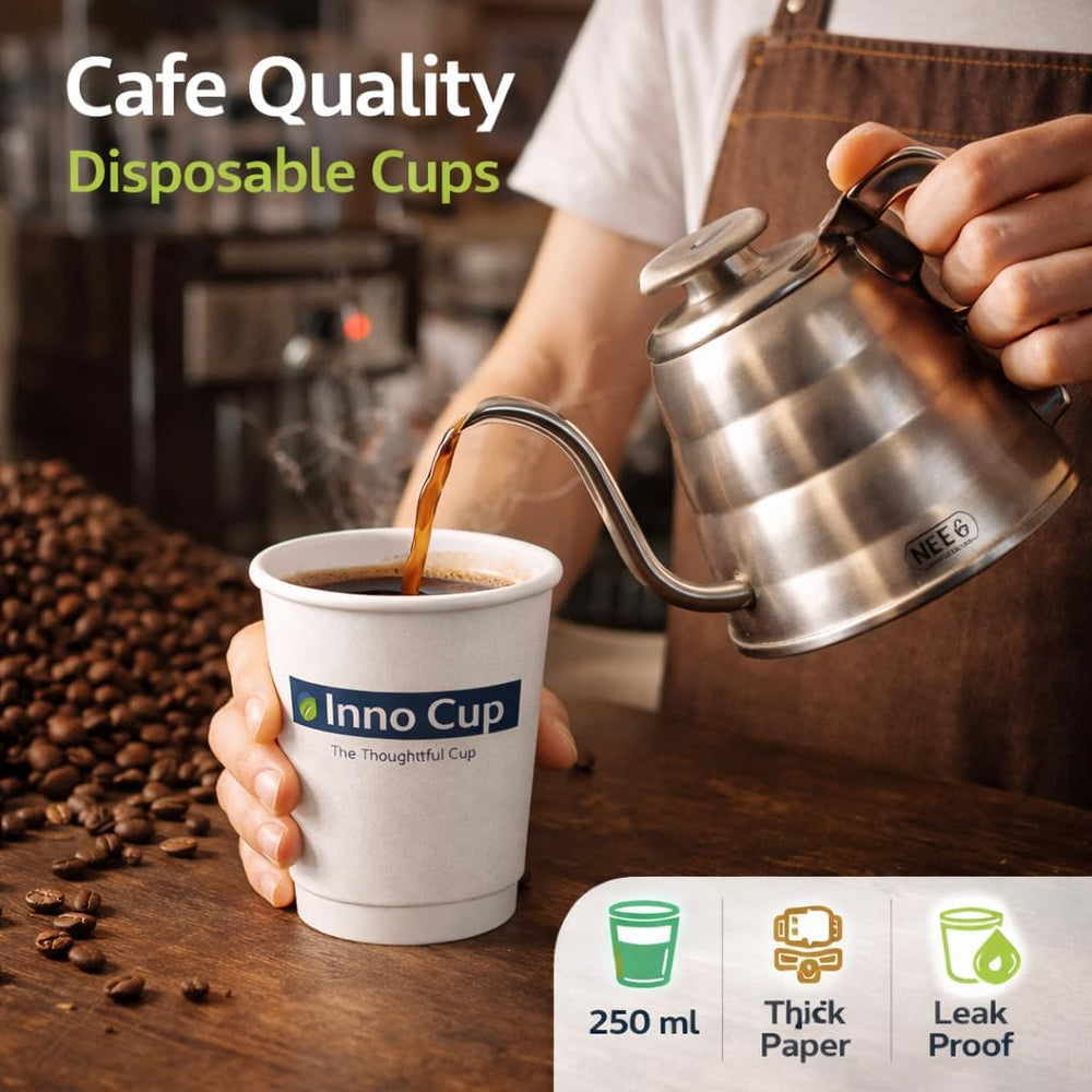 Coffee poured into a 250 ml Inno Cup paper cup at a cafe