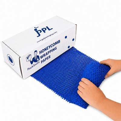 Blue honeycomb paper roll 390 mm x 100 m being pulled from its dispenser box