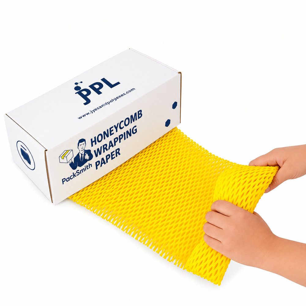 Yellow honeycomb wrapping paper stretched by hand as it comes out of the PackSmith dispenser box