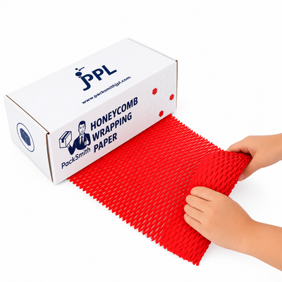 Red honeycomb paper roll 390 mm pulled from a white PackSmith dispenser box by two hands